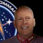 Admiral James D. West, a bald Starfleet officer in a maroon command uniform, smiles in front of a stylized Starfleet Command emblem on a dark background.
